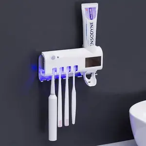 Distributeur de pâte dentifrice et porte brosse à dent