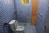 Appartement avec eau chaude parking forage à Emana. 2 chambres 2 douches.