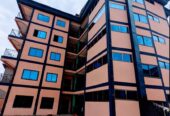 Appartement neuf haut standing, avec parking, forage à Odza petit marché.2 chambres 3 douches.